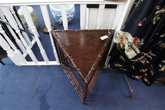 An unusual Chinese rosewood triangular shaped nest of quartetto tables, W.2ft